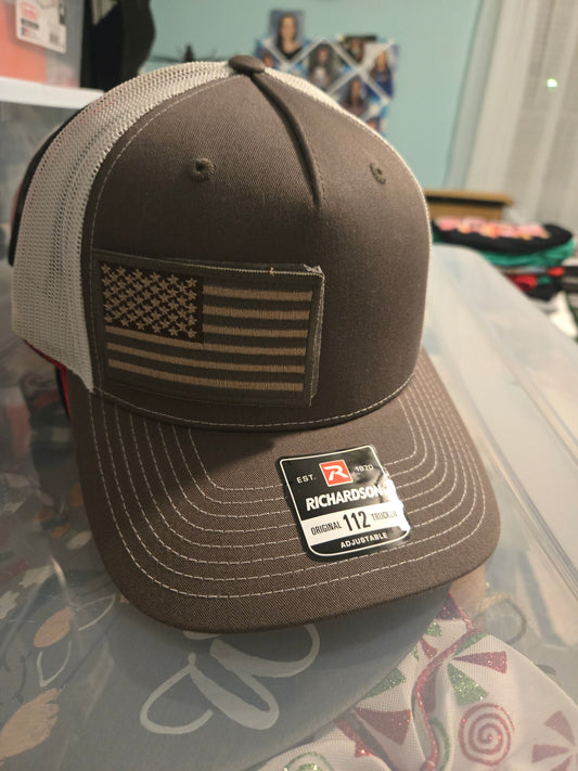 Brown and tan American flag hat